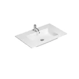 Stylish bathroom inspiration with beige vanity unit with inner drawer, upper cabinet, open shelf, oval mirror with lighting, matching pendants, shelf under the mirror, and wall-mounted toilet. Walls with light, elongated tiles.