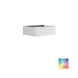 Stylish and spacious bathroom inspiration with a large round mirror with a black frame, dark stone sink, colored toilet, upper cabinet, and open shelf in a sophisticated and muted design