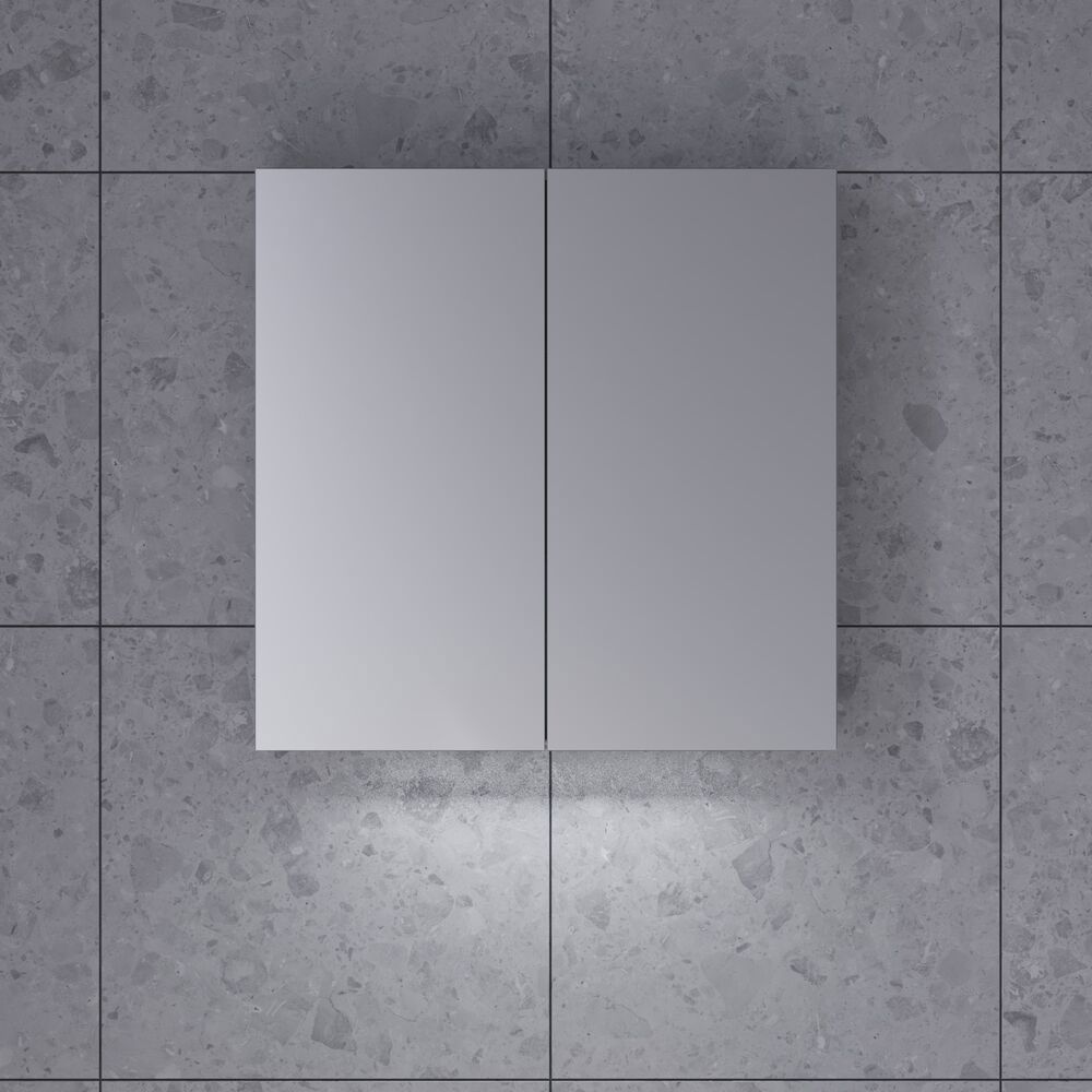 Stylish and minimalist bathroom inspiration featuring a micro basin with a small vanity unit, a square mirror with rounded corners and a lamp, and an elegant mirror cabinet.