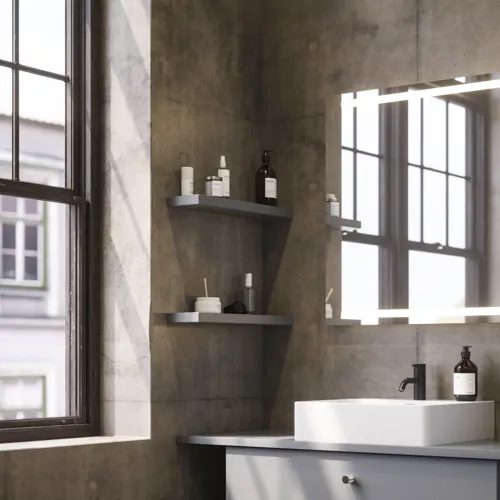 Bathroom inspiration with sloped walls inspiration, grey vanity unit and upper cabinet, custom-made countertops, modern square countertop basin, square mirror with lights, raw concrete walls and floors create an urban look