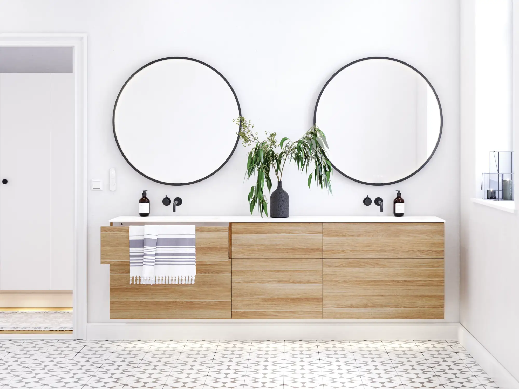 Nordic bathroom in wood finish with beautiful black framed round mirrors and plenty of storage in the furniture