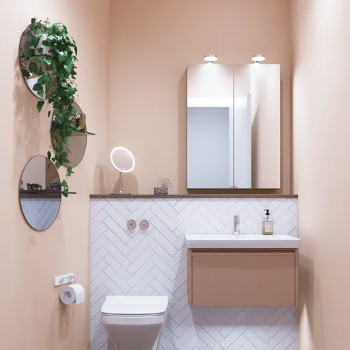 Small bathroom inspiration with a washbasin cabinet in a special color, mirror cabinet with lights, decorative mirrors with tinted glass shelf, white herringbone tiles give a sleek and classic look.