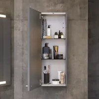 Bathroom inspiration with sloped walls inspiration, grey vanity unit and upper cabinet, custom-made countertops, modern square countertop basin, square mirror with lights, raw concrete walls and floors create an urban look