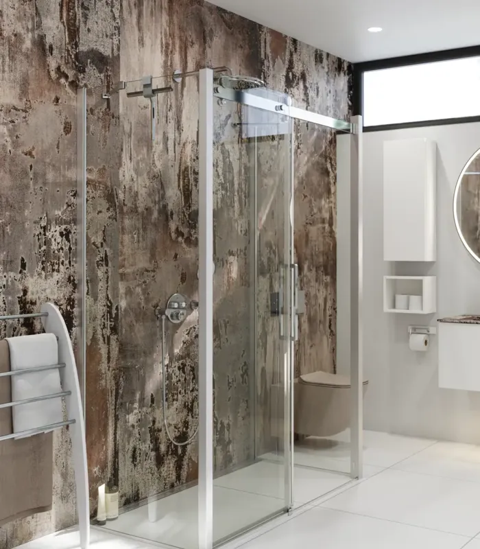Bathroom inspiration with luxurious shower cubicle with sliding door, white bathroom furniture and a raw-look wall that gives the bathroom a raw and urban feel