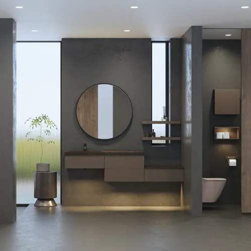 Stylish and spacious bathroom inspiration with a large round mirror with a black frame, dark stone sink, colored toilet, upper cabinet, and open shelf in a sophisticated and muted design