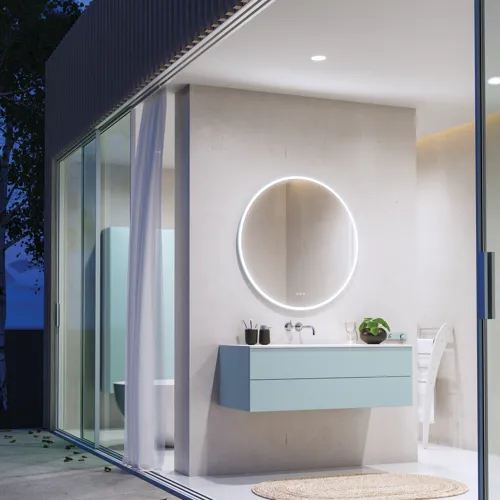 Lovely large bathroom with furniture in light, blue colors oozing with Nordic style