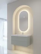 Stylish and modern bathroom inspiration with oval mirrors with light control, stone sinks, and vanity units with fine and elegant grooves in a minimalist design, the bathroom has a light and airy atmosphere with elegant lighting and refined details