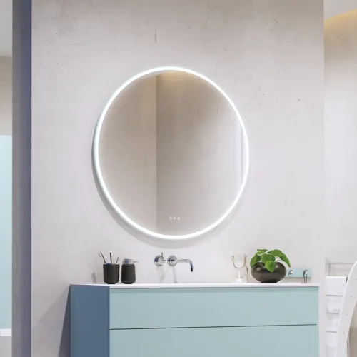 Lovely large bathroom with furniture in light, blue colors oozing with Nordic style