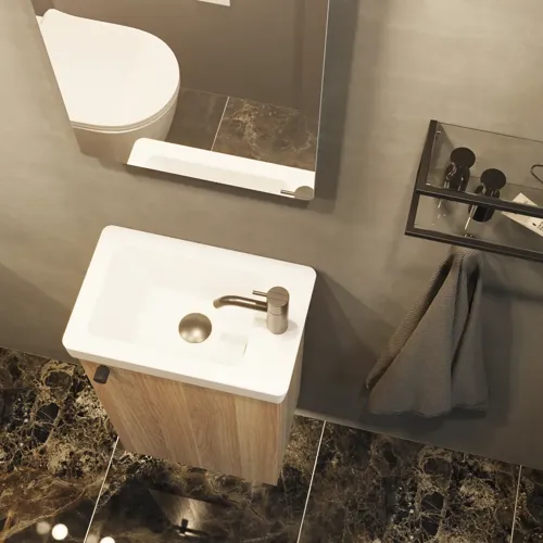 Stylish and minimalist bathroom inspiration featuring a micro basin with a small vanity unit, a square mirror with rounded corners and a lamp, and an elegant mirror cabinet.