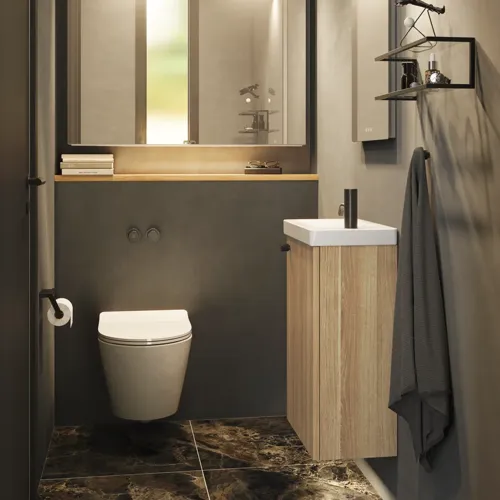 Stylish and minimalist bathroom inspiration featuring a micro basin with a small vanity unit, a square mirror with rounded corners and a lamp, and an elegant mirror cabinet.