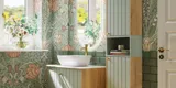 Bathroom inspiration with green special color bathroom furniture with natural oak sides, elegant grooves, stylish countertop with romantic oval countertop sink, beautiful oval mirror, combined with floral wallpaper gives a graceful, vintage retro look.