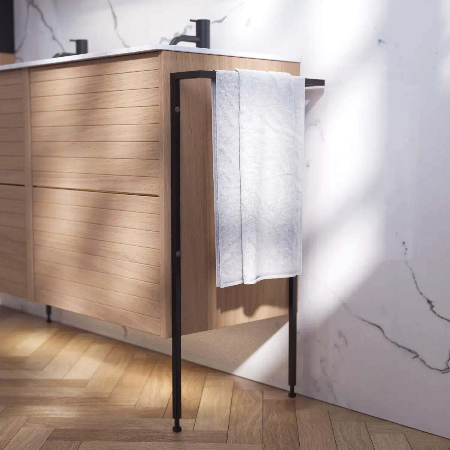 Bathroom inspiration with washbasin cabinets and wall cabinets in light oak with grooves, elegant double sink, beautiful mirror cabinet with light, herringbone floor in light wood, and white marble wall give a classic, bright, and sleek look.