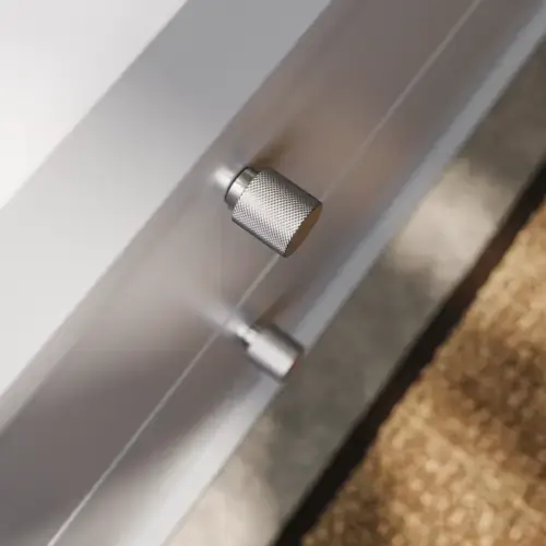 Bathroom inspiration with sloped walls inspiration, grey vanity unit and upper cabinet, custom-made countertops, modern square countertop basin, square mirror with lights, raw concrete walls and floors create an urban look