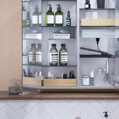 Small bathroom inspiration with a washbasin cabinet in a special color, mirror cabinet with lights, decorative mirrors with tinted glass shelf, white herringbone tiles give a sleek and classic look.