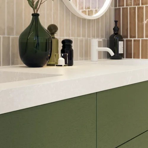 Large and luxurious bathroom with lovely oval mirrors and beautiful tiles in natural colours