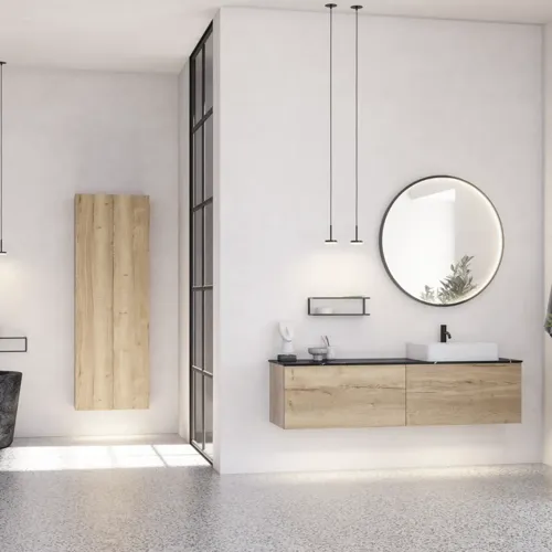 Large urban bathroom inspiration with natural oak furniture, stone countertop with square basin, round mirror with black frame, natural colors, and terracotta floor for an industrial and modern look