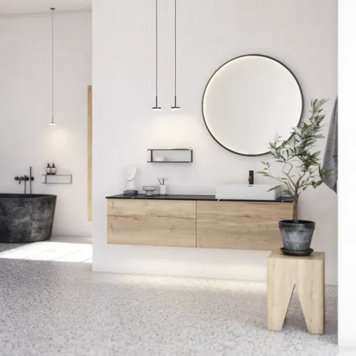 Large urban bathroom inspiration with natural oak furniture, stone countertop with square basin, round mirror with black frame, natural colors, and terracotta floor for an industrial and modern look