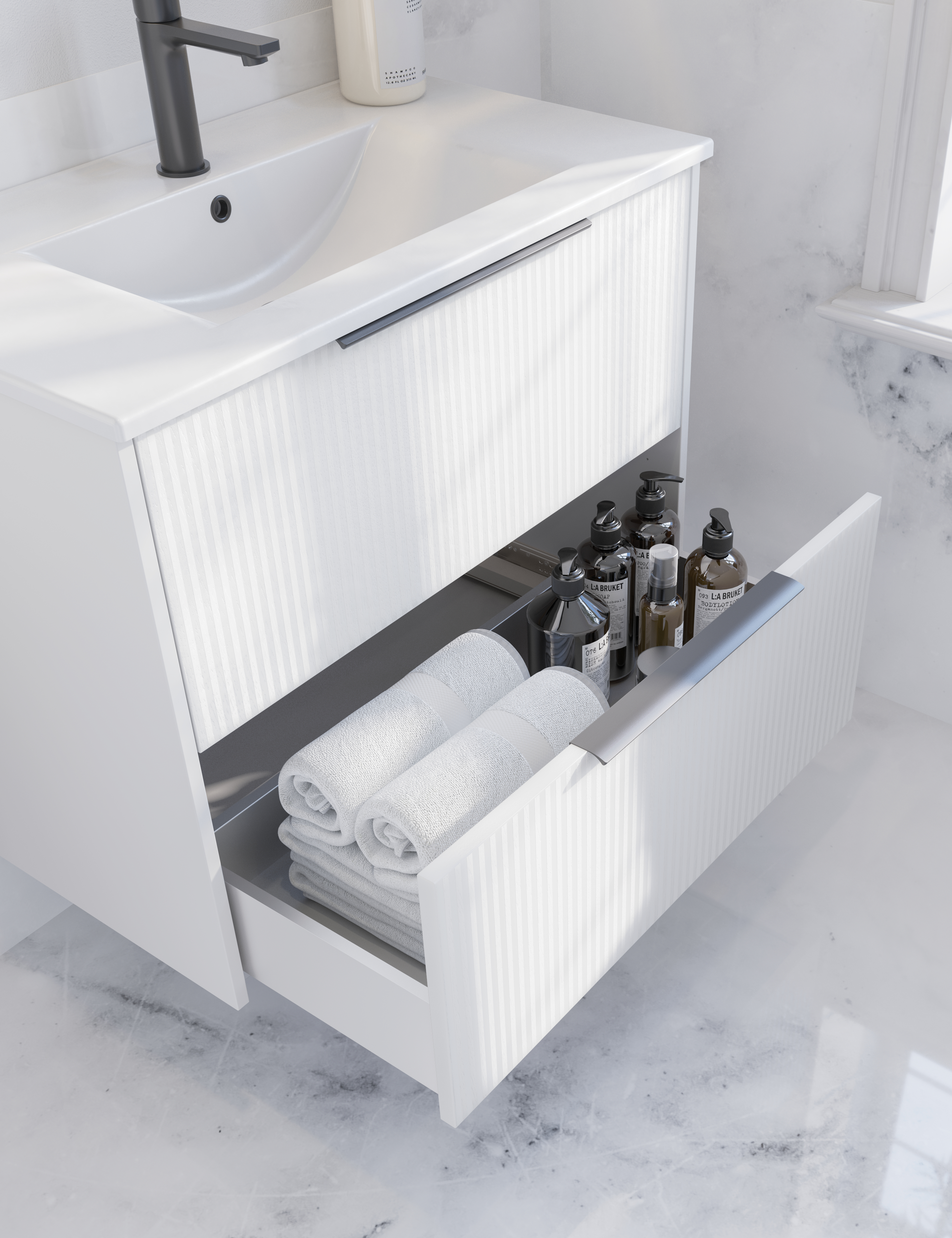 Bathroom inspiration with white vanity unit with elegant grooves and beautiful washbasin, white marble walls and floor for a bright and modern look.
