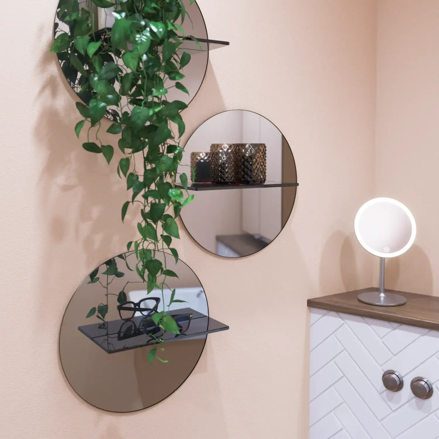 Small bathroom inspiration with a washbasin cabinet in a special color, mirror cabinet with lights, decorative mirrors with tinted glass shelf, white herringbone tiles give a sleek and classic look.