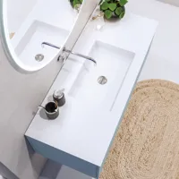 Lovely large bathroom with furniture in light, blue colors oozing with Nordic style