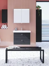 Large bathroom inspiration with bathroom furniture in Black Structure with elegant basins and a beautiful mirror cabinet with integrated lighting, terrazzo floor and red walls and tiles for a modern look.