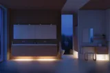 Modern bathroom in Nordic style with light wood, elegant lighting, mirror cabinet wall, and stylish decor, creating a warm and inviting atmosphere.