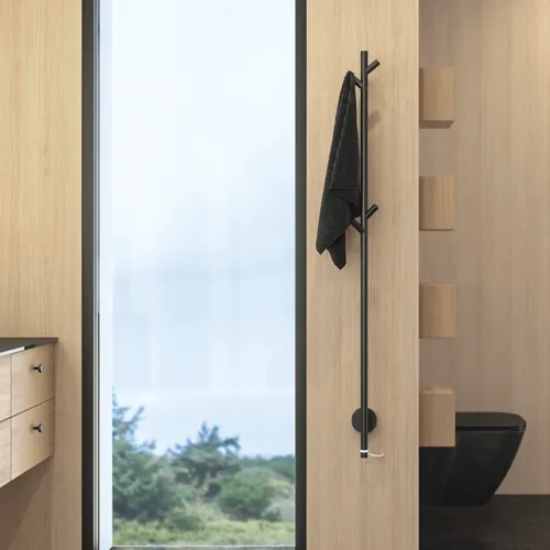 Stylish bathroom in Scandinavian and Japandi design with light wood walls, round mirror, and minimalist bathroom furniture.