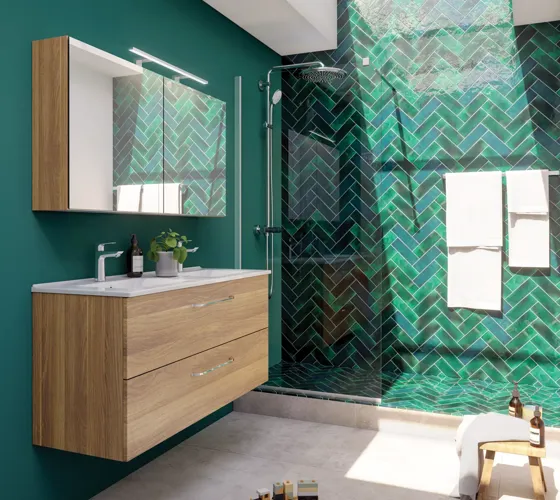 Large bathroom inspiration with a vanity unit in Warm Oak, elegant double sink, beautiful mirror cabinet and shower screen, green herringbone tiles for a sophisticated look.