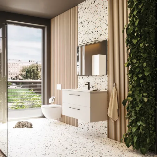 Large bathroom inspiration with bathroom furniture in matt white with elegant washbasin and square mirror with black rim and lamp, terrazzo wall and floor and plants on the wall for a modern and sophisticated look.