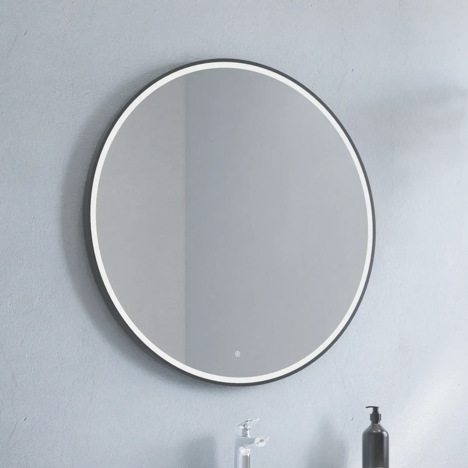 Large bathroom inspiration with vanity unit in Warm Oak with elegant washbasin, chrome handles and beautiful round mirror with black edge and light, herringbone floor and grey walls for a modern look.