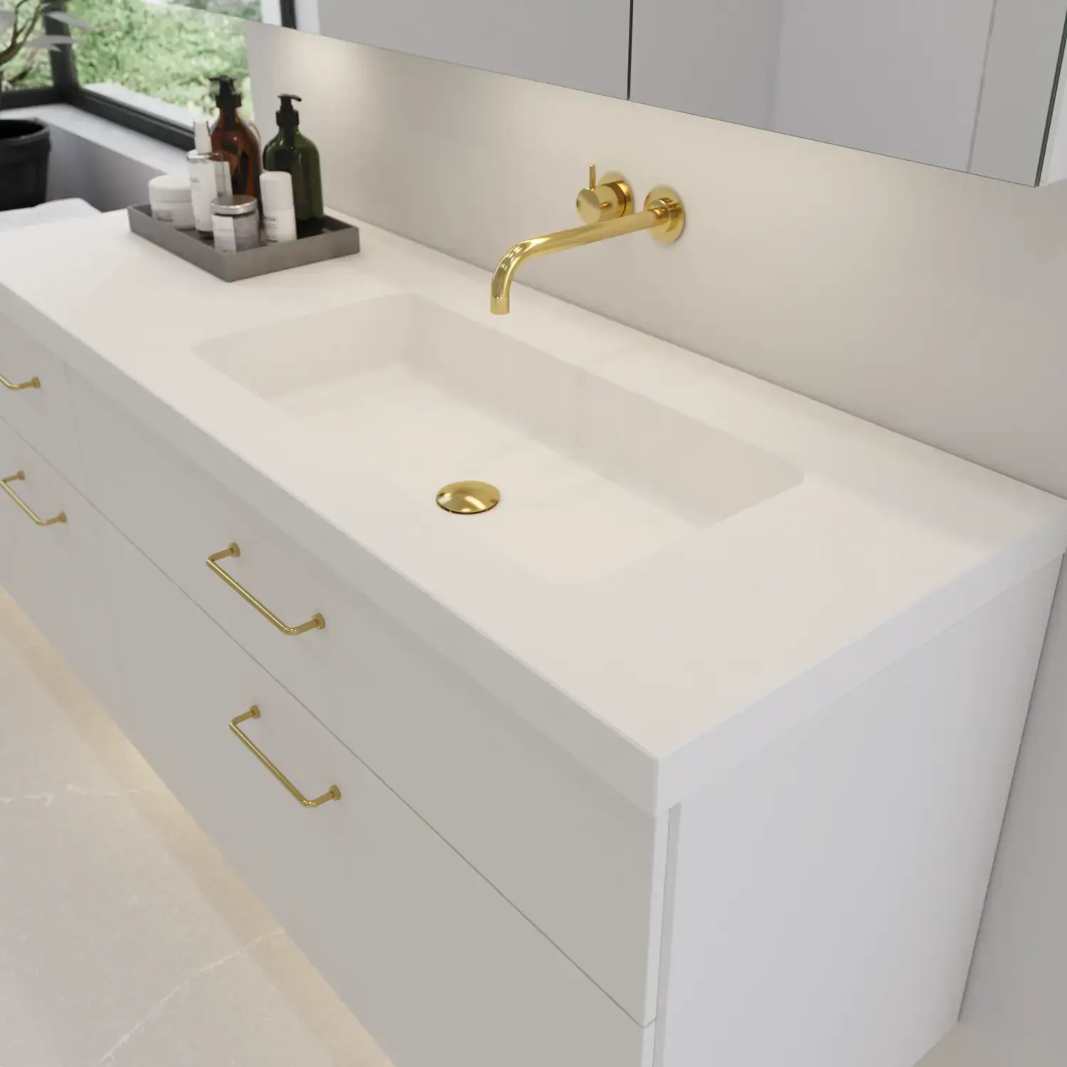 Large bathroom inspiration with elegant stone sink in Blanco Zeus with stylish white vanity unit with brass handles and beautiful mirror cabinet with stone floor for an exclusive and modern look.