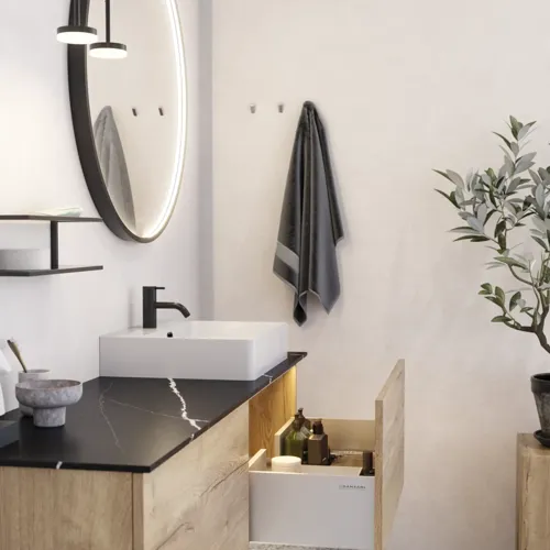 Large urban bathroom inspiration with natural oak furniture, stone countertop with square basin, round mirror with black frame, natural colors, and terracotta floor for an industrial and modern look
